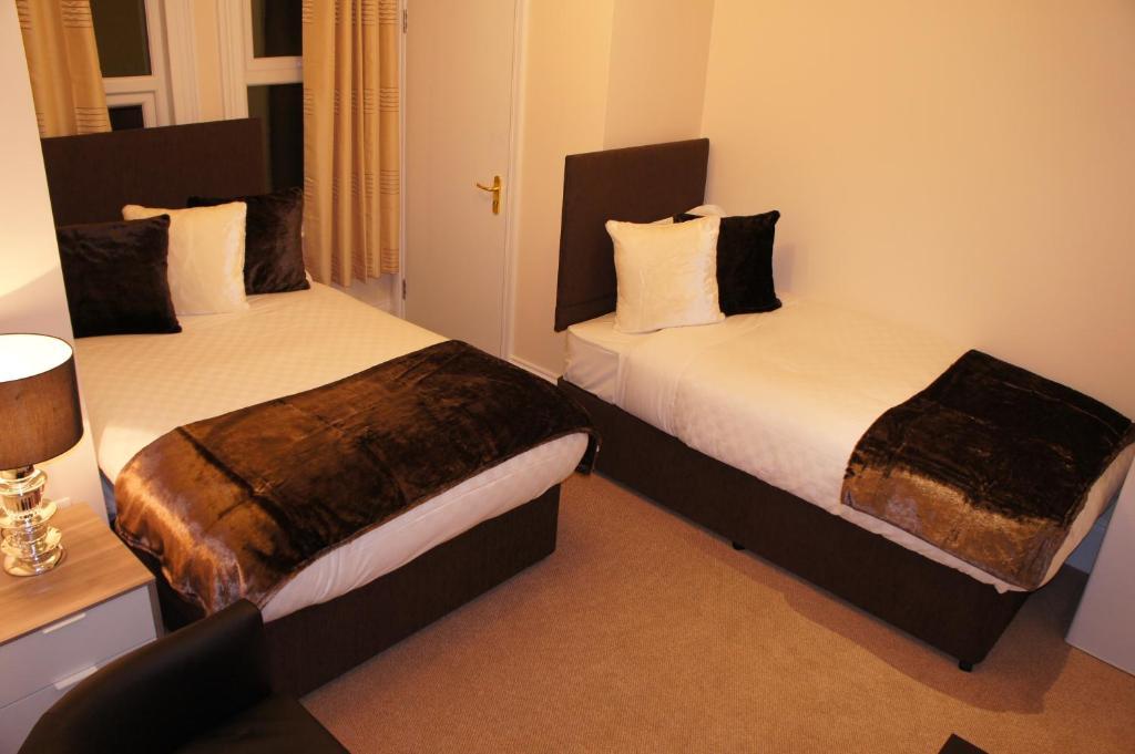 Sapphire Hotel London Londres Quarto foto
