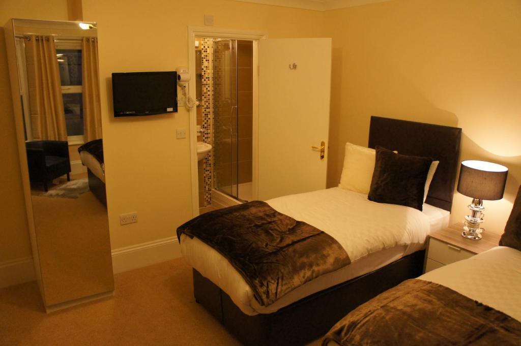 Sapphire Hotel London Londres Quarto foto